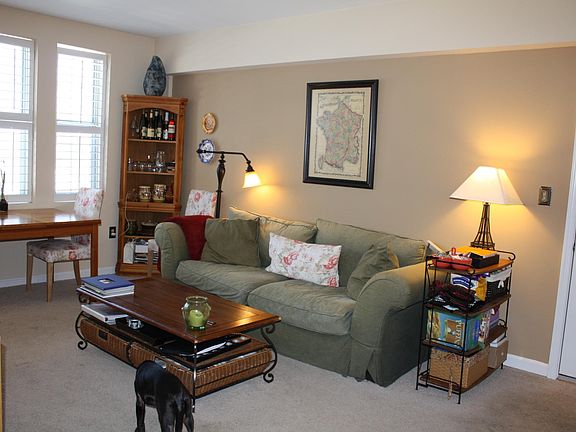 Comfortable, sunny living room, now with wood floors