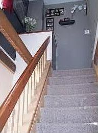 Staircase leading to the bedrooms upstairs.