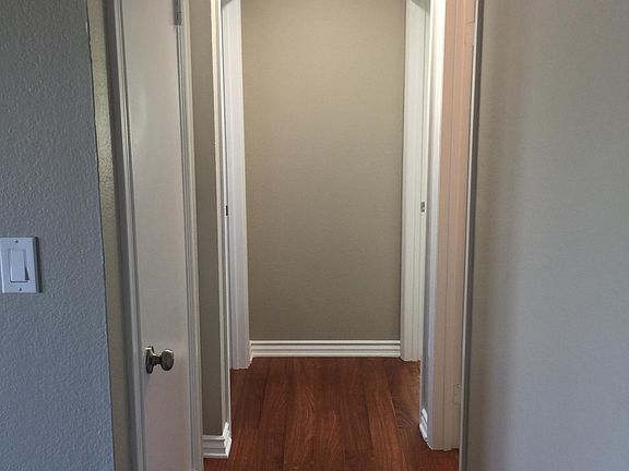 Hallway with Coat Closet and Linen Closet
