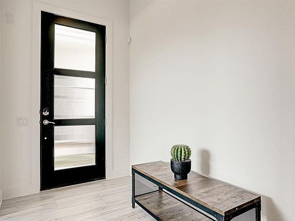 Walk into the contemporary with upgraded tile floors on the first floor.