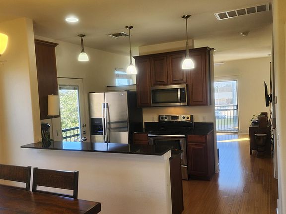 Stainless Steel appliances throughout the kitchen.