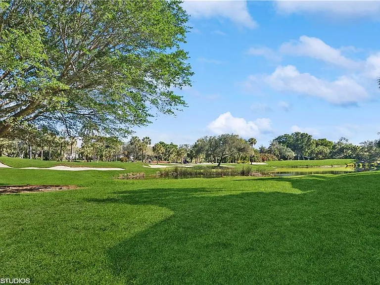 7048 Pelican Bay Blvd #C-105 — Photo 20