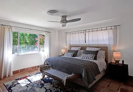 Master Bedoom w/ En-suite Bathroom with Private Ficus Hedges Front Yard View