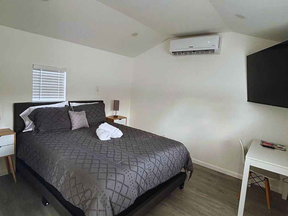 Queen bed with soft linens, comfy pillows & cool A/C.