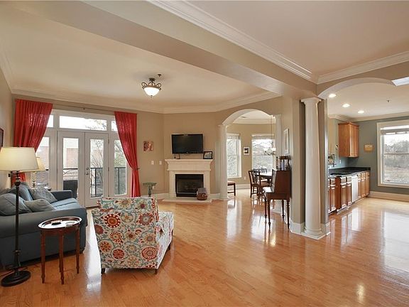Large fireside family room with separate dining room & private terrace.