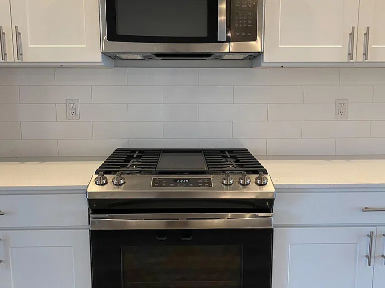Gas Range and Microwave in every home