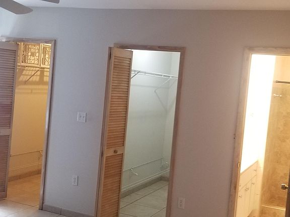 master bedroom his and hers walking closets