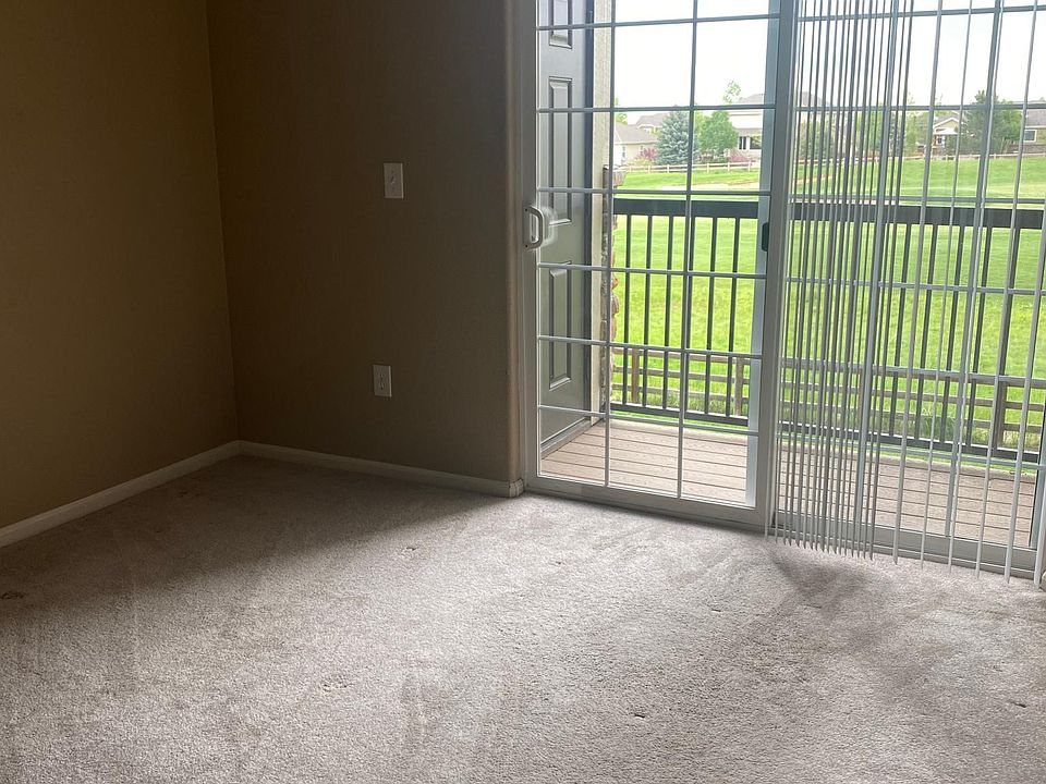 Bedroom with 2nd balcony and golf course views - lots of natural light!