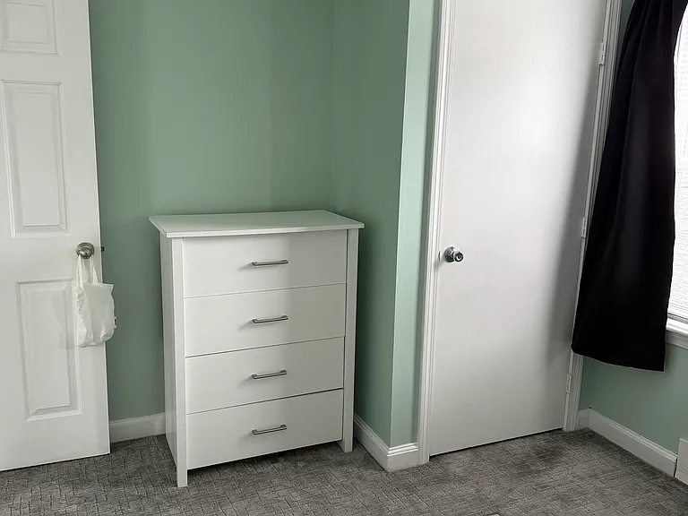 full-size bed closet and one bureau