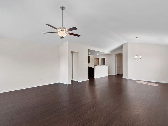 The living area is open to the kitchen and dining room.