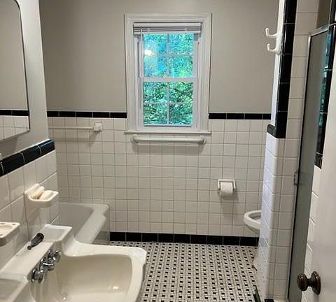 Bathroom with tub and shower