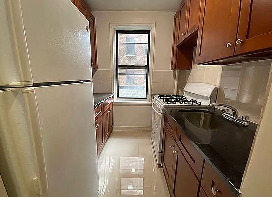 5th image of 66-20 Wetherole St #1D1