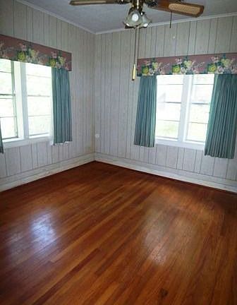 bedroom with wood floors