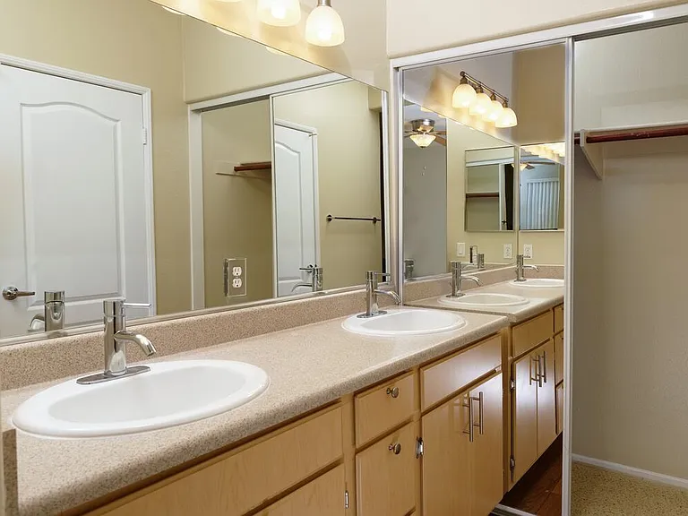 Classic Package II bath with laminate countertops, oak cabinetry, and hard surface flooring