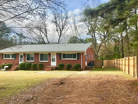 Dirt/Gravel Driveway - Fenced Backyard