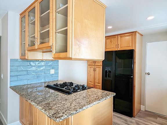 Refreshed kitchen with new tile and fixtures