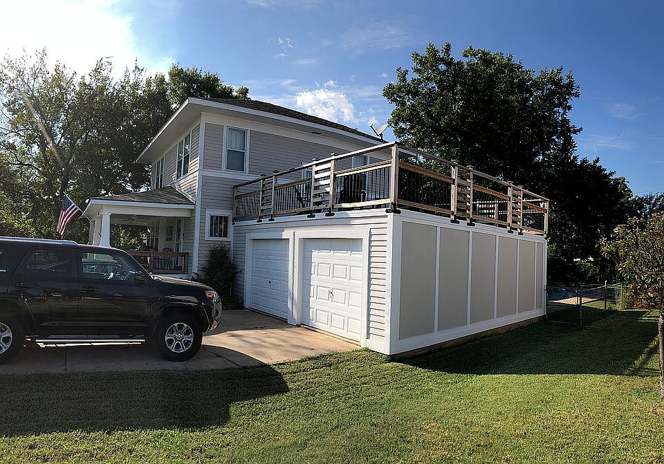 New garage with sun deck.