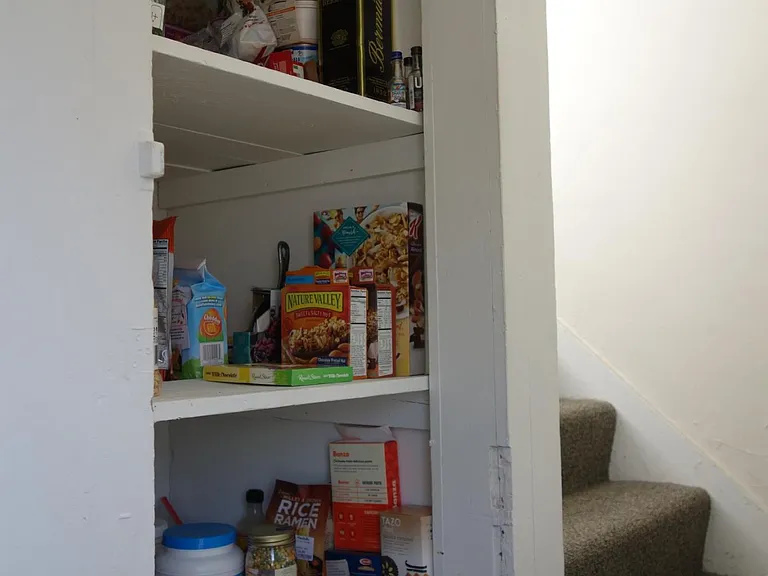 Extra pantry space next to kitchen
