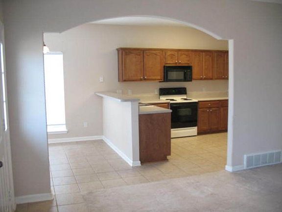 view into kitchen from living room