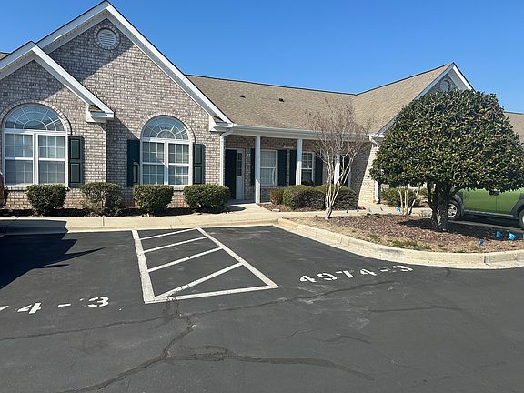 2 oversized parking spaces, handicap parking