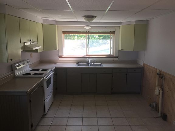 kitchen. The refrigerator isn't shown here but it is located on the left wall beside the washer/dryer hook up