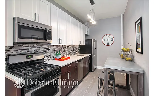 Sold by Douglas Elliman | media 18