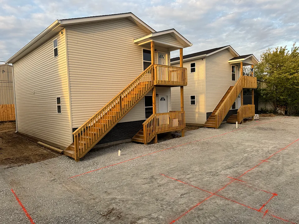 Exterior View of 2 buildings, 4 units shown here