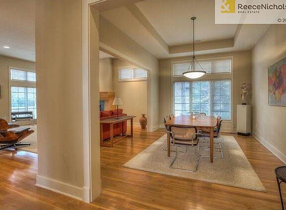 View from large entry is the open, light-filled living room and dining room.