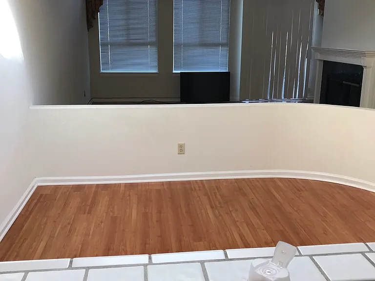 Kitchen view of Dining and Living room