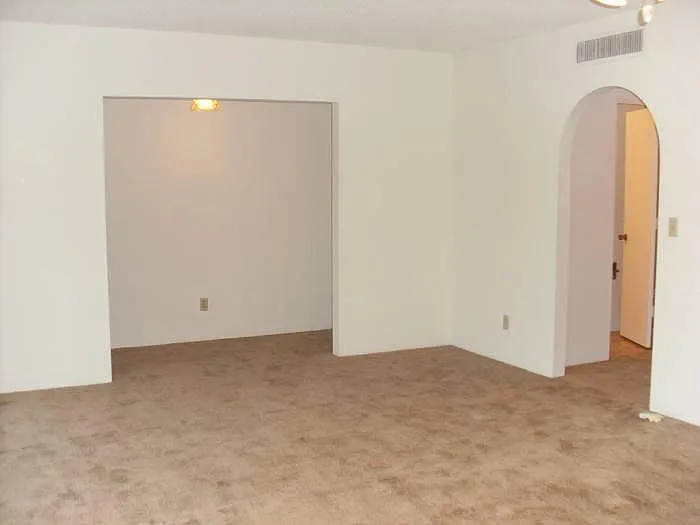 Very large master bedrm with nook and full bathrm (through archway).