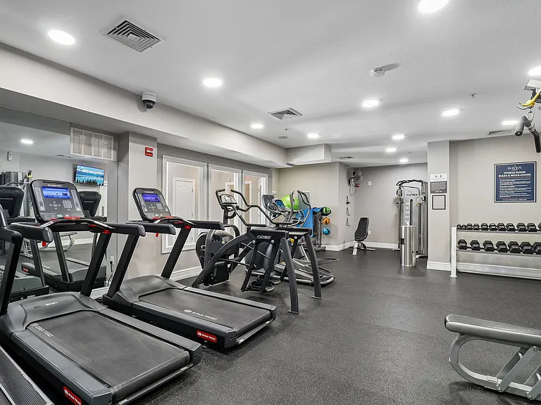 Fitness center with weight training and cardio equipment