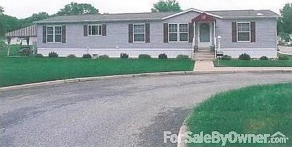 Front View : Located on a corner lot with lots of space!