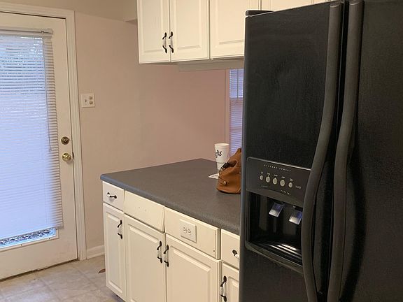 Kitchen; breakfast bar open to dining/living