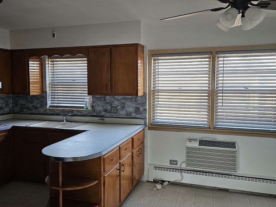 1st image of 7734 W Belmont Ave Unit 2