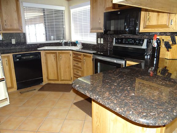 4th image of 11424 E 39th Ln