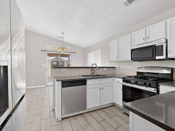 4th image of 9908 Rawhide Ave SW