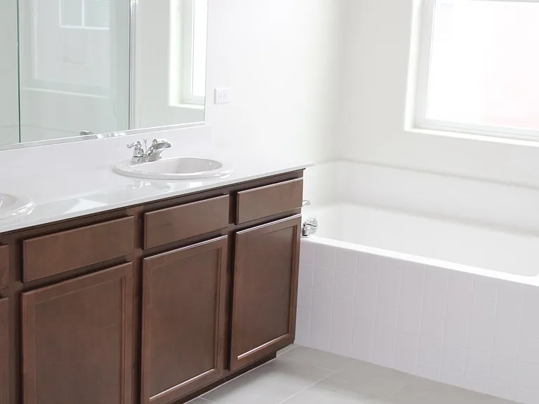 Master bath with large soaking tub and dual sinks