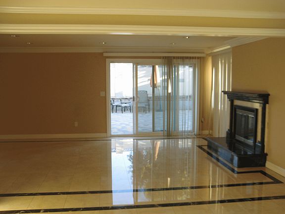 living room with marble fireplace