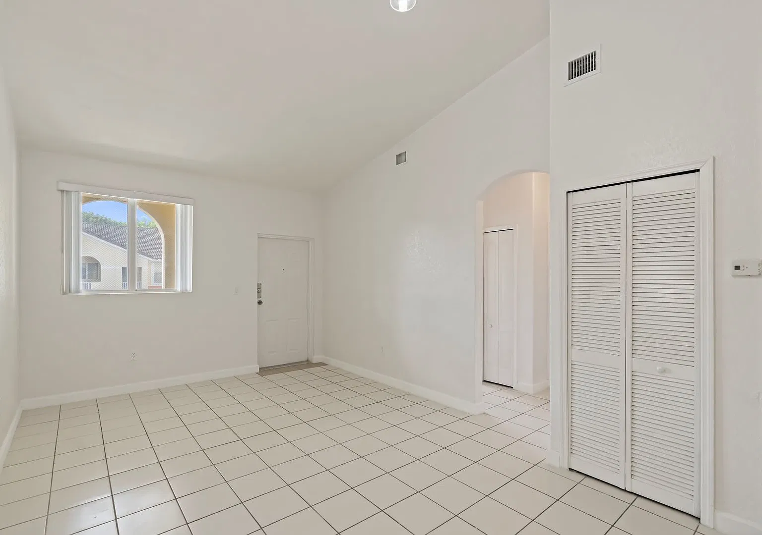2-bath condo on the 2nd floor with a newly renovated kitchen featuring modern cabinets and granit... — Photo 3