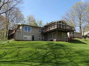 Second view of back yard & showing the walk out area for cookouts & entertaining. Plenty of room to roam. Ready for your family.