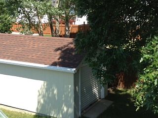 Large shingled/guttered shed