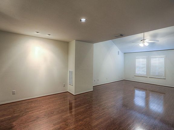 VIEW OF SECOND FLOOR LIVING/DINING RMS,GLEAMING OAK HARDWOOD FLOORS ARE IN GREAT SHAPE, THE OWNERS H