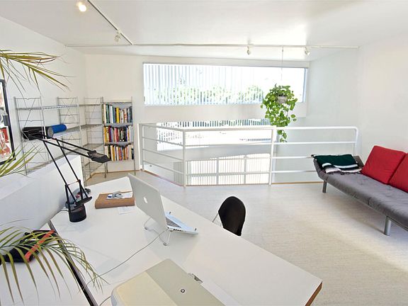 Loft can be used as an office or open bedroom