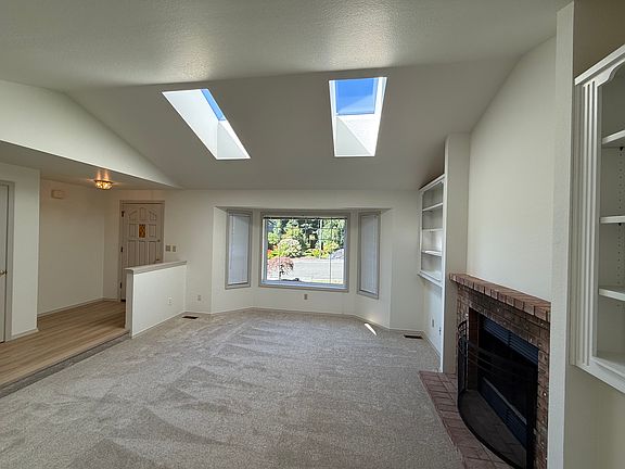 Living room with 2 sky lights