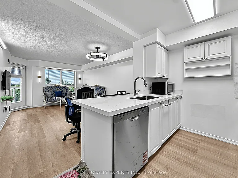 300 Ray Lawson Blvd #512 — Photo 4