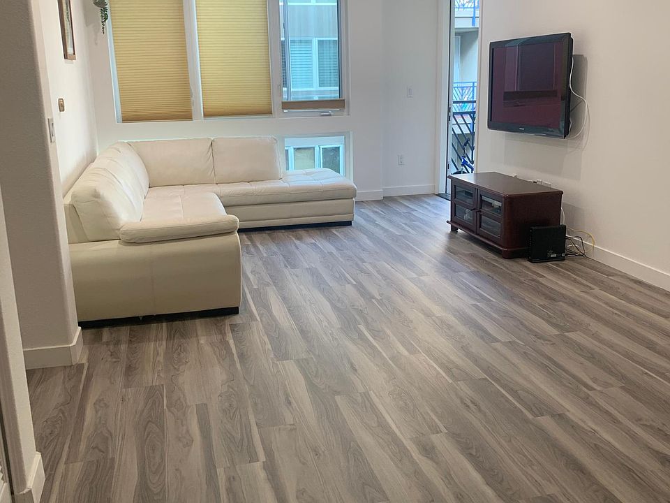 Living Room with new flooring and lights