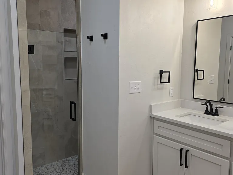 Master bath shower area & vanity