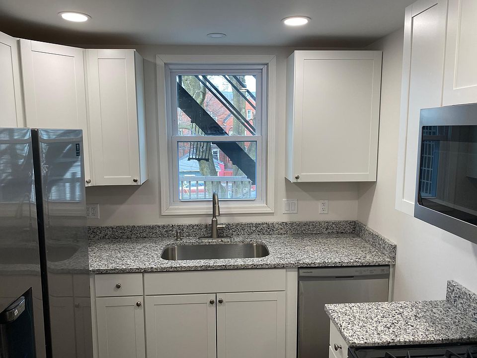 complety brand new kitchen with dishwasher/garbage disposal/stove/microwave/fridge with water & ice. Granite countertops & shaker cabinets