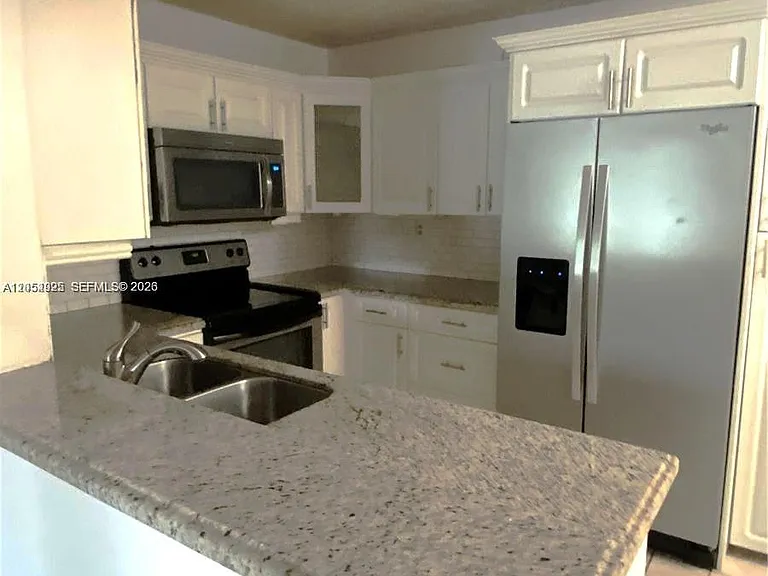 300 Palm Cir W #208 — Photo 1