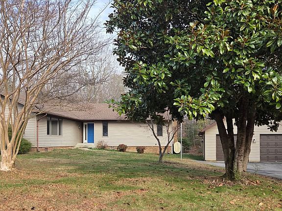 Detached 2 car garage and plenty of driveway parking